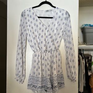 Hollister Romper that was never used and brand new. Cute & causal to use!